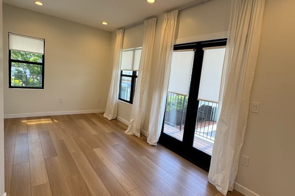 Primary Bedroom has French Doors leading to 3rd Balcony