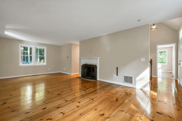 Living room w/ Wood Burning Fireplace