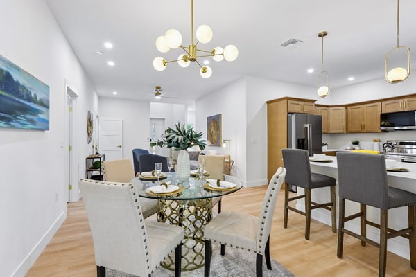 Bright and welcoming open-concept dining and kitchen area, perfect for entertaining and everyday living.