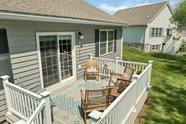 Bright outdoor space featuring welcoming seating and attractive landscaping, perfect for relaxation and gatherings.