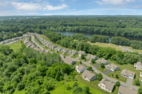 Spacious homes nestled near scenic river views, offering convenient access to nature and local amenities.