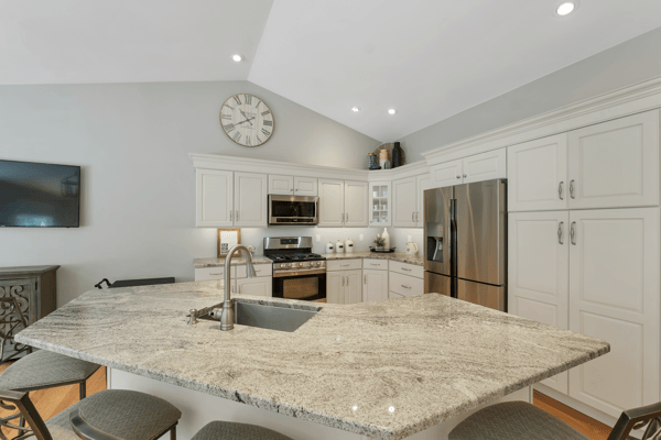 Bright and functional kitchen featuring modern appliances, a spacious island, and ample cabinetry for storage.