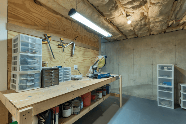 Spacious workshop with ample storage, perfect for DIY projects and organized workspace.