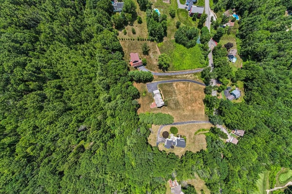 Expansive wooded lot with easy access to local amenities, perfect for private development or investment opportunities.