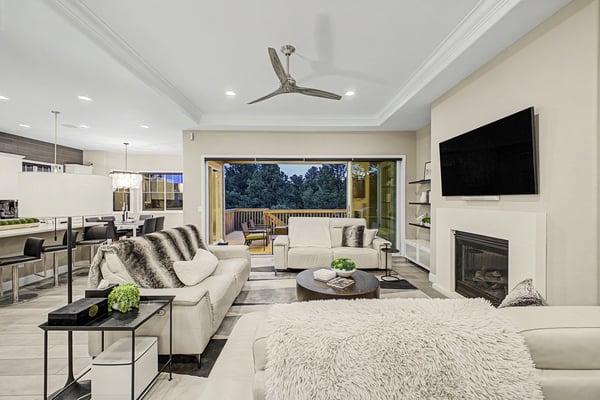 Bright and spacious living area with modern finishes, large windows, and seamless indoor-outdoor flow.