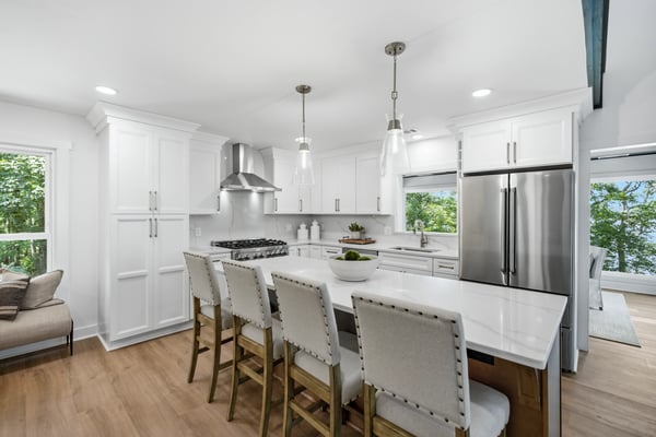 Modern kitchen featuring stainless steel appliances, ample cabinetry, and a spacious island perfect for gatherings.