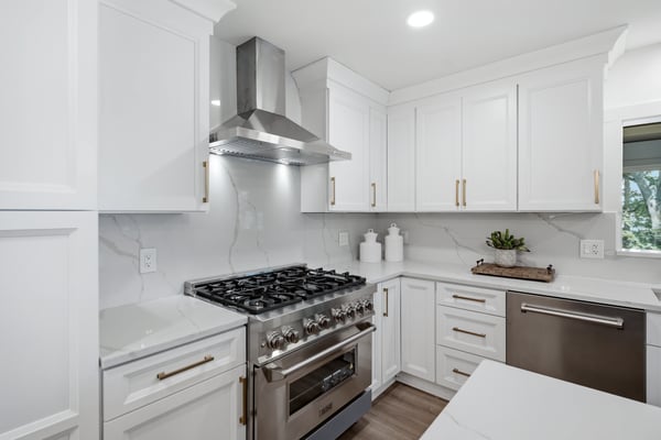 Modern kitchen featuring sleek cabinetry, high-end stainless steel appliances, and spacious countertops for culinary creativity.