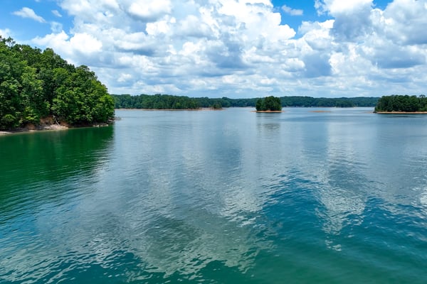 Breathtaking waterfront property offering panoramic views and direct access to tranquil waters, perfect for nature lovers.