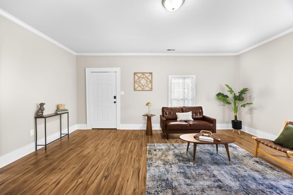 Spacious living area featuring modern finishes, abundant natural light, and a welcoming open layout.