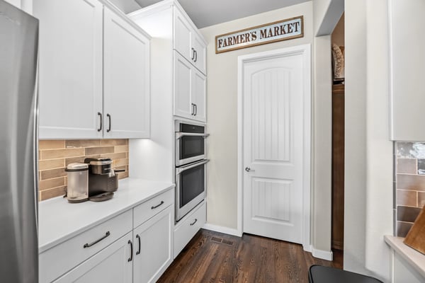 Coffee Bar in Kitchen that leads to pantry.