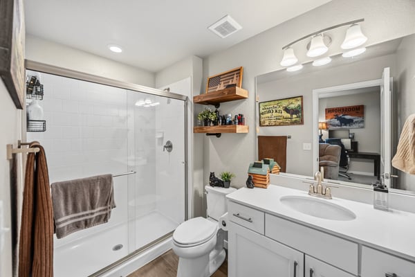 Jr Suite in basement with attached bathroom.