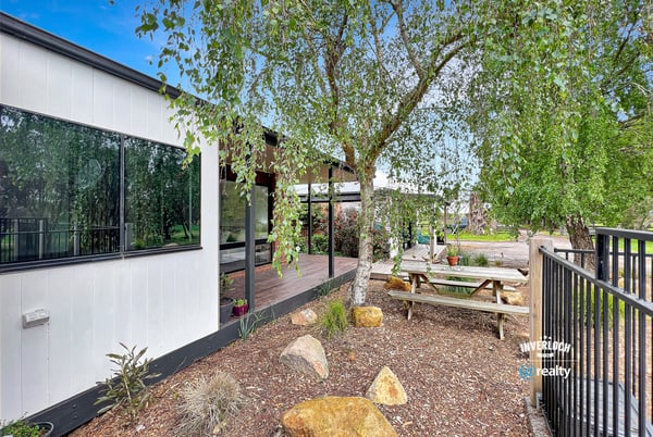 This property features a modern home surrounded by landscaped outdoor spaces ideal for entertaining and relaxation.