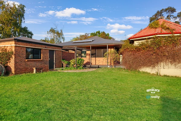 Spacious outdoor area complements this inviting property, perfect for relaxation and entertaining in a family-friendly neighborhood.