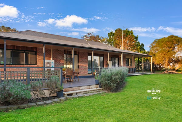 Spacious outdoor area complements this inviting home, perfect for entertaining and enjoying nature’s beauty.