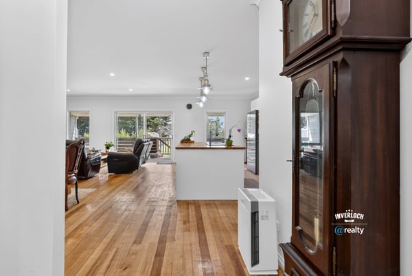Spacious entryway leads to an inviting living area with ample natural light and modern features.