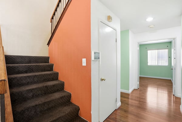 Discover a welcoming entryway leading to spacious rooms with abundant natural light and versatile living areas.