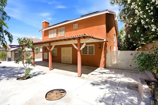 Spacious home with a large outdoor area, perfect for gatherings and enjoying sunny days.