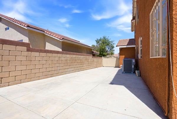 Spacious side yard offers ample room for outdoor projects or additional parking options.
