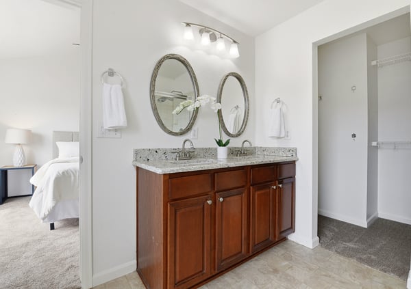 Convenient dual sinks and large walk-in closet.