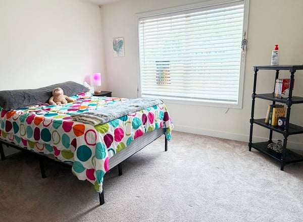 Bedroom 2 w/ Neutral Carpet & Double Door Closet