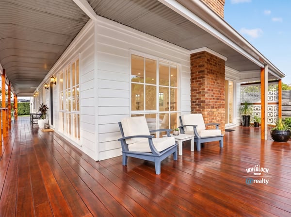 Spacious deck perfect for outdoor relaxation, featuring ample natural light and modern architectural details.