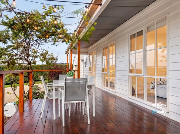 Inviting outdoor space with string lights, perfect for entertaining or relaxing in the fresh air.