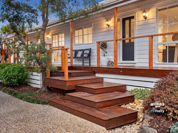 Discover outdoor living with a welcoming entryway, perfect for entertaining or enjoying peaceful moments.