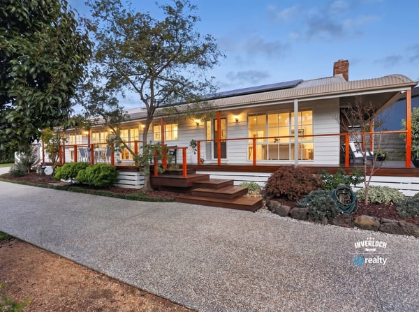 This inviting home features spacious outdoor areas and modern amenities, perfect for comfortable living and entertaining.