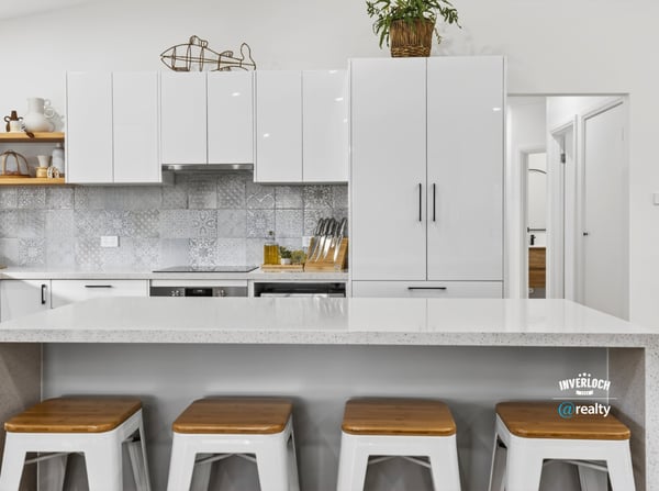 Modern kitchen featuring sleek cabinetry, a spacious island, and contemporary finishes perfect for entertaining.