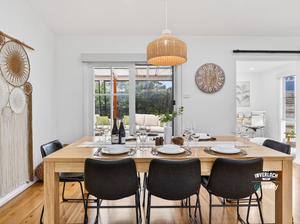 Bright dining area featuring natural wood accents, perfect for gatherings and everyday meals with family.