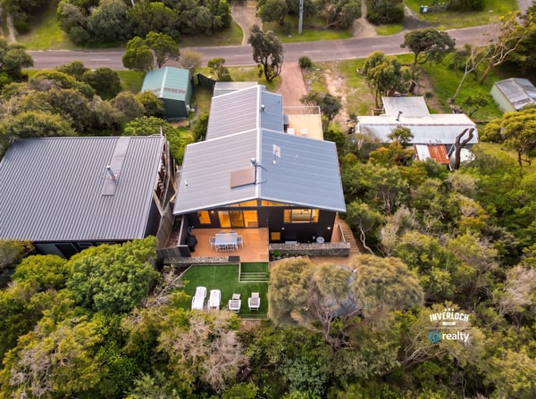 Discover a unique retreat surrounded by lush greenery, offering modern comforts and outdoor living space.