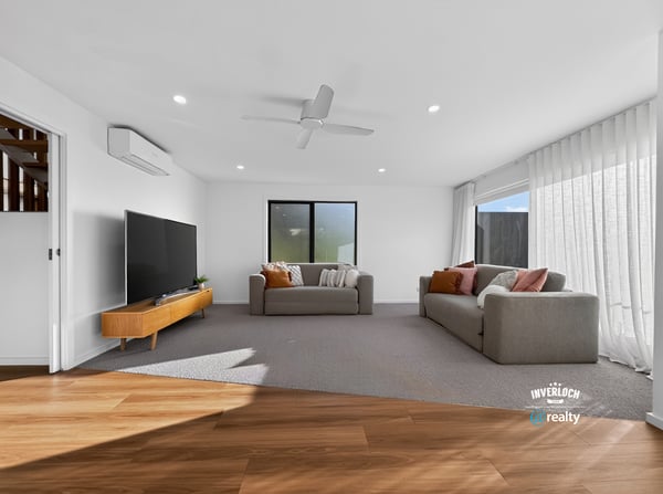 Bright and spacious living area features modern finishes and abundant natural light, perfect for relaxation.