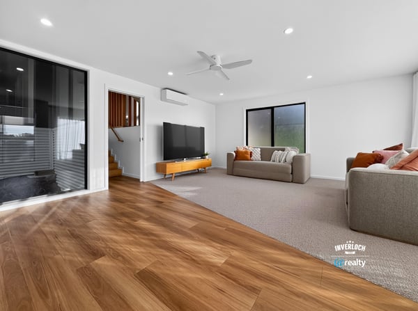 Bright and spacious living area featuring modern design and seamless indoor-outdoor flow.