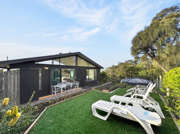 Contemporary home featuring lush outdoor space, perfect for entertaining and enjoying scenic views.