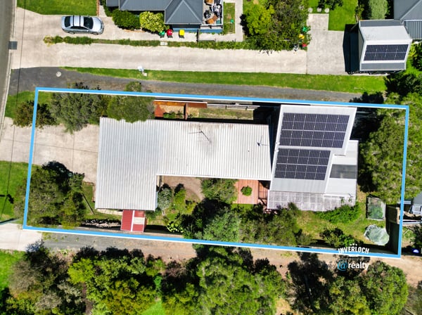 Spacious property featuring solar panels and ample outdoor space, nestled in a vibrant neighborhood.