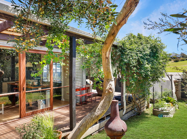 Bright and inviting home featuring expansive outdoor space and modern design, perfect for relaxed living.