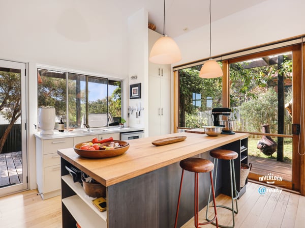Bright and spacious kitchen featuring modern appliances and seamless indoor-outdoor flow, ideal for entertaining.