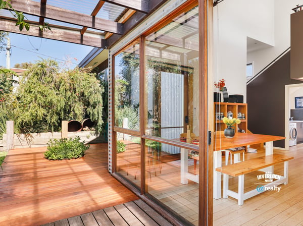 Bright and inviting indoor-outdoor space featuring natural light and a spacious dining area.