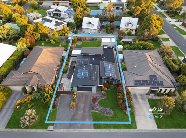 Modern home featuring solar panels and a spacious backyard in a desirable neighborhood. Conveniently located near amenities.