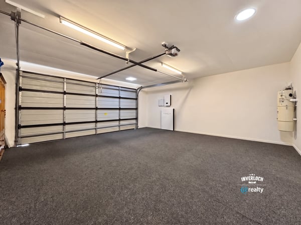 Spacious garage with ample storage options and a clean, versatile layout ready for your projects.