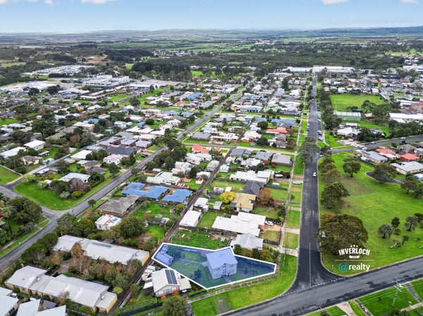 Spacious suburban property with expansive greenspace and convenient access to local amenities and transport.