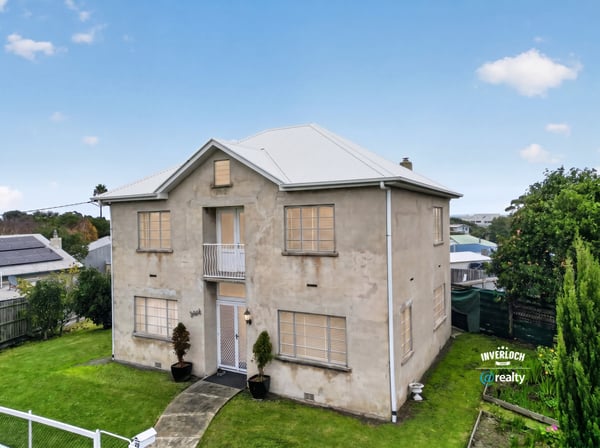 This distinctive two-story residence features ample outdoor space and modern upgrades in a vibrant neighborhood.