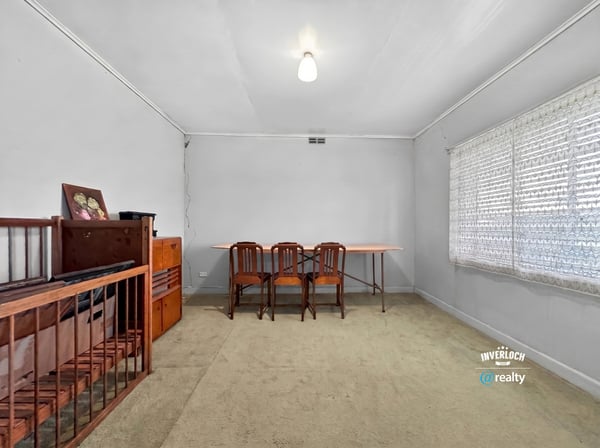 Spacious room with abundant natural light, ideal for an office or creative workspace.
