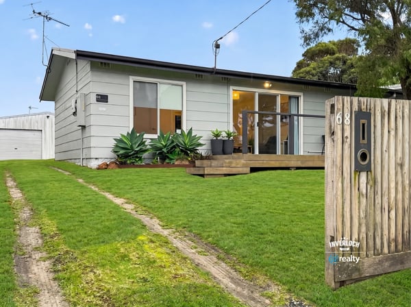 This cozy home features a spacious yard, modern design elements, and convenient access to local amenities.