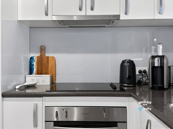 Modern kitchen featuring sleek cabinetry, contemporary appliances, and a functional layout for effortless cooking.