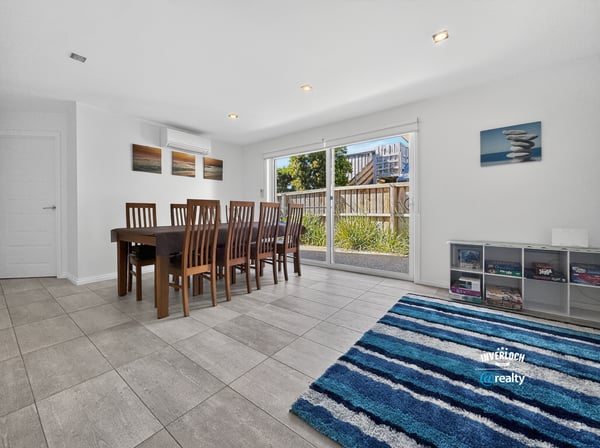 Spacious dining area with natural light, offering a seamless connection to the outdoor space.