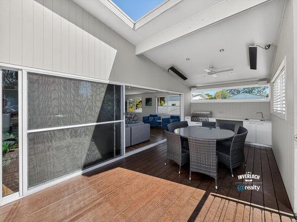 Spacious outdoor living area featuring a modern design, perfect for entertaining and relaxation.
