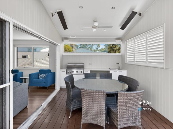 Bright and spacious outdoor entertaining area featuring modern amenities and a seamless indoor-outdoor flow.