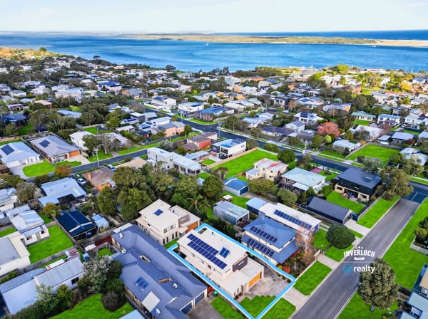 Experience coastal living with this modern home in a vibrant community, offering breathtaking water views.