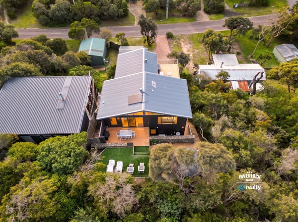 Discover a unique retreat surrounded by lush greenery, offering modern comforts and outdoor living space.